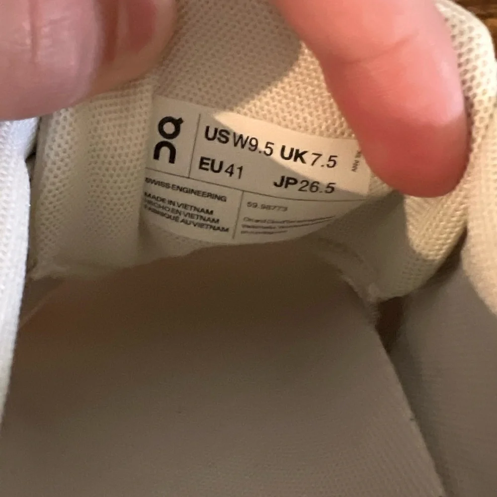 On Running Neutral Cream and White Running Sneakers